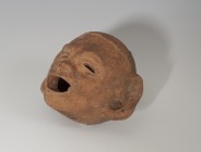 PREHISPÁNICO. Cultura Mixteca. Cabeza masculina (600-1250 d.C.). Terracota. Con orificio inferior y boca abierta. Altura 9,3 cm.