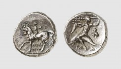 Calabria. Tarentum. 272-235 BC. AR Nomos (6.47g, 7h). SNG ANS 1165; Vlasto 836. Old cabinet tone. Choice extremely fine. From the Sadijas collection; ...