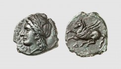 Sicily. Syracuse. 310-305 BC. Æ (4.23g, 3h). SNG ANS 646; CNS 85. Splendid dark green patina. Choice extremely fine. From the Sadijas collection; Trad...