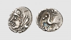Celtica. The Bituriges Cubi. Bourges area. 1st century BC. AR Denarius (1.94g, 9h). LT -; DT 3436. Old cabinet tone. Areas of weakness. Good very fine...