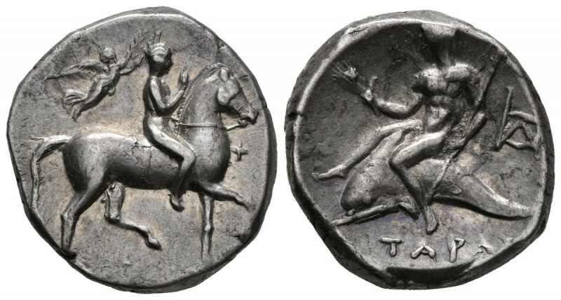 CALABRIA, Taranto. Didracma. (Ar. 6.57g \/ 21mm). 272-240 BC Anv: Young man on h...