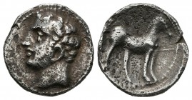CARTAGONOVA (Cartagena, Murcia). 1\/4 Shekel. (Ar. 1.75g \/ 13mm). 220-205 BC Anv: Male head to the left. Rev: Horse standing to the right. (FAB-545)....