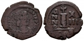 JUSTINIANO I. Decanummiun. (Ae. 4.21g \/ 19mm). 541-542 AD (Year 15). Cycic. (Sear 167). G.