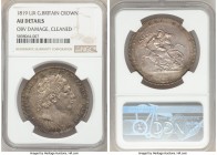 George III Crown 1819-LIX AU Details (Obverse Damage, Cleaned) NGC, KM675, S-3787. Olive-gray, blue and rose-gold toning. Pit below chin and scratch n...