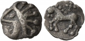 CELTIC, Central Europe. Vindelici . 1st century BC. 1/4 Quinar (Silver, 8 mm, 0.23 g, 3 h), Manching, 'Stachelhaar' Type. Celticized head to left, wit...