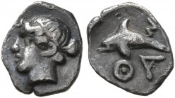 ISLANDS OFF THRACE, Thasos. Circa 412-404 BC. Hemiobol (Silver, 8 mm, 0.27 g, 6 h). Head of a nymph to left. Rev. ΘA-Σ Dolphin left. Le Rider, Thasien...