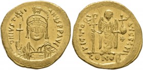 Justinian I, 527-565. Solidus (Gold, 20 mm, 4.42 g, 5 h), Constantinopolis. D N IVSTINIANVS P P AVI Helmeted and cuirassed bust of Justinian facing, h...