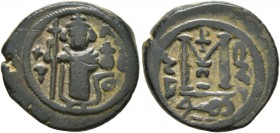ISLAMIC, Umayyad Caliphate. Uncertain period (pre-reform), AH 41-77 / AD 661-697. Fals (Bronze, 19 mm, 4.73 g, 5 h), Imitating Constans II, Dimashq (D...