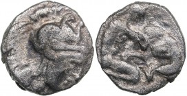 Calabria - Tarentum AR Diobol - (circa 325-280 BC)
0.79 g. 11mm. VF/VF Head of Athena right, wearing helmet decorated with Skylla./ Heracles kneeling...