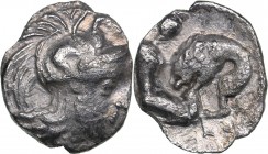 Calabria - Tarentum AR Diobol - (circa 325-280 BC)
0.75 g. 12mm. VF/VF Head of Athena right, wearing helmet decorated with Skylla./ Heracles kneeling...