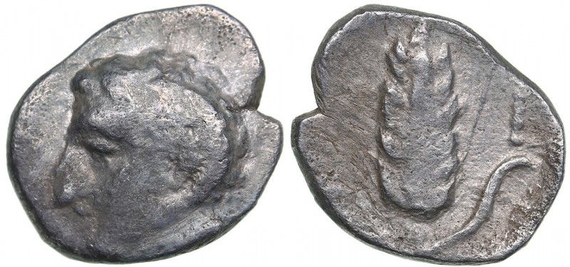 Lucania - Metapontion AR Diobol - (circa 325-275 BC)
0.84 g. 11mm. F/F Head of ...