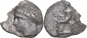 Bruttium - Terina AR Drachm (circa 300 BC)
1.97 g. 17mm. F/F Head of female left./ Nike seated left on cippus, holding bird.