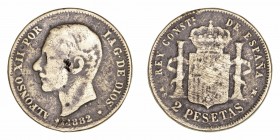 La Peseta
Alfonso XII
2 Pesetas. Latón. 1882 MSM. Falsa de época. 5.89g. Barrera 1030. MBC-.