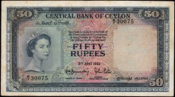 CEYLON

CEYLON. Central Bank of Ceylon. 50 Rupees, 1952. P-52. Very Fine.

A Very Fine example of this Central Bank of Ceylon 50 Rupees note. Stai...