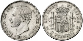 1882*1882. Alfonso XII. MSM. 2 pesetas. (AC. 32). Reverso girado 15º. Golpecito. 10,01 g. MBC/MBC+.