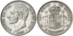 1883/1*1883. Alfonso XII. MSM/DEM. 5 pesetas. (AC. 52). Raras rectificaciones. 24,79 g. BC+/MBC-.