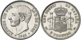 1883*1883. Alfonso XII. MSM/DEM. 5 pesetas. (AC. 54). Golpecitos y rayitas. Rara rectificación. 25,04 g. MBC/MBC+.