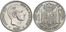 1881. Alfonso XII. Manila. 50 centavos. (AC. 115). En canto: LEY-REY-PATRIA. 12,81 g. MBC.