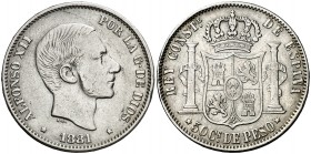 1881. Alfonso XII. Manila. 50 pesos. (AC. 114). En canto: LEY-PATRIA-REY. Golpecitos. 13 g. MBC-/BC+.