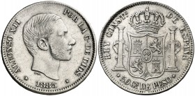 1883. Alfonso XII. Manila. 50 centavos. (AC. 120). En canto: (LEY)-PATRIA-REY. Parte de la leyenda del canto borrada. 13 g. MBC/MBC+.
