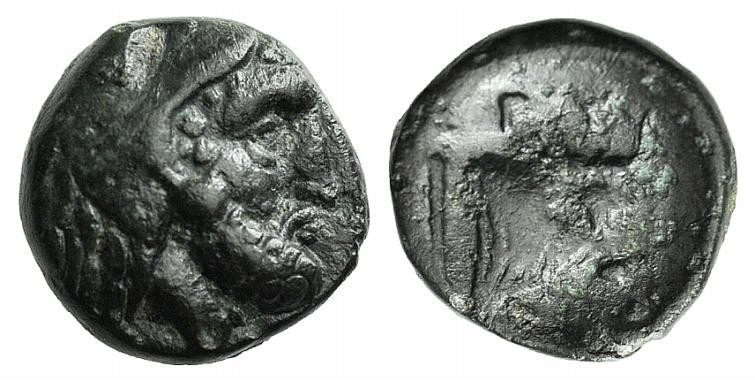 Ionia, Erythrai, c. 480-400 BC. Æ (8mm, 0.97g, 3h). Head of Herakles r., wearing...