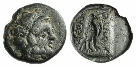 Caria, Keramos, 2nd-1st century BC. Æ (11.5mm, 1.73g, 12h). Dionysos, magistrate. Laureate head of Zeus r. R/ Eagle standing r., within incuse square....