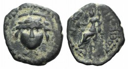 Lycaonia, Eikonion, c. 1st-2nd century AD. Æ (15mm, 2.16g, 6h). Facing gorgoneion. R/ Female seated l., holding patera. von Aulock, Lykaonien 252; SNG...