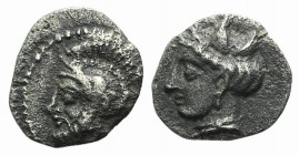 Cilicia, Tarsos, 4th century BC. AR Obol (8mm, 0.50g, 9h). Helmeted and bearded head of warrior (Ares?) l. R/ Female head l., wearing tripartite crown...