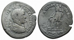 Caracalla (198-217). Ionia, Magnesia ad Maeandrum. Æ (34mm, 14.74g, 6h). Laureate, draped and cuirassed bust r. R/ Serapis seated l., holding sceptre;...