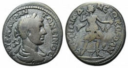 Elagabalus (218-222). Ionia, Ephesus. Æ (30mm, 15.22g, 6h). Laureate, draped and cuirassed bust r. R/ Artemis advancing r., holding bow and removing a...