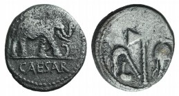 Julius Caesar, military mint traveling with Caesar, April-August 49 BC. AR Denarius (17mm, 3.49g, 11h). Elephant advancing r., trampling on horned ser...