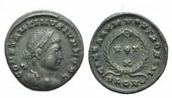 Constantine II (Caesar, 316-337). Æ Follis (18mm, 3.18g, 6h). Londinium, 323-4. Laureate bust r. R/ VOT/•/X in three lines within wreath; PLON-crescen...