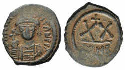 Tiberius II (578-582). Æ 20 Nummi (24mm, 6.63g, 6h). Constantinople. Crowned and cuirassed facing bust, holding globus cruciger and shield with horsem...