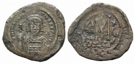 Maurice Tiberius (582-602). Æ 40 Nummi (30mm, 9.69g, 6h). Constantinople, uncertain year. Helmeted and cuirrased facing bust, holding globus cruciger ...