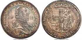Archduke Maximilian Taler 1618-CO MS65 NGC, Hall mint, KM227.1, Dav-3324. A remarkable specimen in all respects, lavishly imbued with a rainbow of iri...