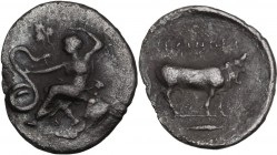 Sicily. Selinos. AR Litra, 466-415 BC. Nymph seated left on rock, holding snake and raising hand above head. / Man-headed bull standing right; in exer...