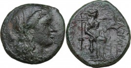 Sicily. Syracuse. Pyrrhos (278-276 BC). AE Litra. Wreathed head of Kore right; uncertain symbol behind. / Demeter seated half-right, holding grain ear...