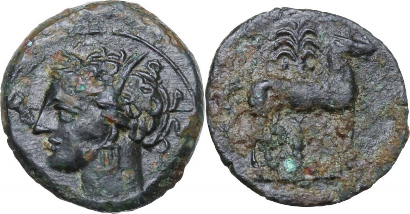 Punic Sicily. AE 17 mm, late 4th - early 3rd century BC. Head of Tanit left, wea...