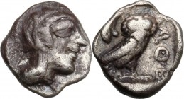 Continental Greece. Attica, Athens. AR Obol, 479-393 BC. Head of Athena right, wearing helmet decorated with wreath. / Owl standing right, head facing...