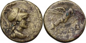 Greek Asia. Phrygia, Apameia. AE 22 mm, 133-48 BC. Bust of Athena right, helmeted. / Eagle standing right on meander, wings open, flanked by the pilei...