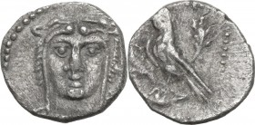 Greek Asia. Cilicia, uncertain mint. AR Obol, 4th century BC. Head of Herakles facing, wearing lion skin. / Eagle standing left on head of stag; all i...