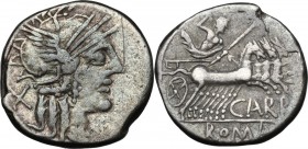 Cn. Papirius Carbo. AR Denarius, 121 BC. Head of Roma right, helmeted. / Jupiter in quadriga right; holding reins and sceptre; hurling thunderbolt. Cr...