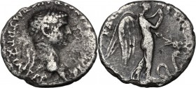 Claudius (41-54). AR Denarius, 50-51. Laureate head right. / Victory standing right, head lowered, holding winged caduceus; at feet to right, serpent ...