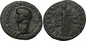 Claudius (41-54). AE As, 42-43 AD. Bare head left. / Libertas standing right, holding pileus in right hand and extending left hand. RIC I (2nd ed.) 11...