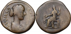 Lucilla, wife of Lucius Verus (died 183 AD). AE Sestertius, circa 164-169 AD. Draped bust right. / Juno seated left, holding patera and scepter. RIC I...