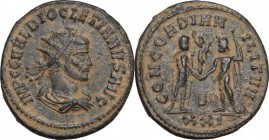 Diocletian (284-305). AE Antoninianus, Cyzicus mint. Radiate, draped and cuirassed bust right. / Aurelian standing right, holding sceptre and receivin...