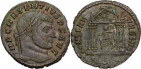 Maxentius (306-312). AE Follis, 310-311 AD. Rome mint. Head right, laureate. / Hexastyle temple containing the statue of Roma seated left, holding glo...