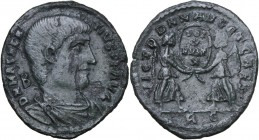 Magnentius (350-353). AE Follis, 351-352, Rome mint. Bust right, bare headed draped. / Two Victories standing facing each other, holding shield inscri...