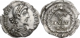 Theodosius I (379-395). AR Siliqua, Mediolanum mint, c. 387. Pearl-diademed, draped, and cuirassed bust right. / VOT/X/MVLT/XX all within wreath; in e...