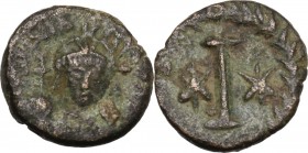 Justinian I (527-565). AE Decanummium. Rome mint. Struck 547-549. Helmeted and cuirassed facing bust, holding globus cruciger and shield. / Large I; s...